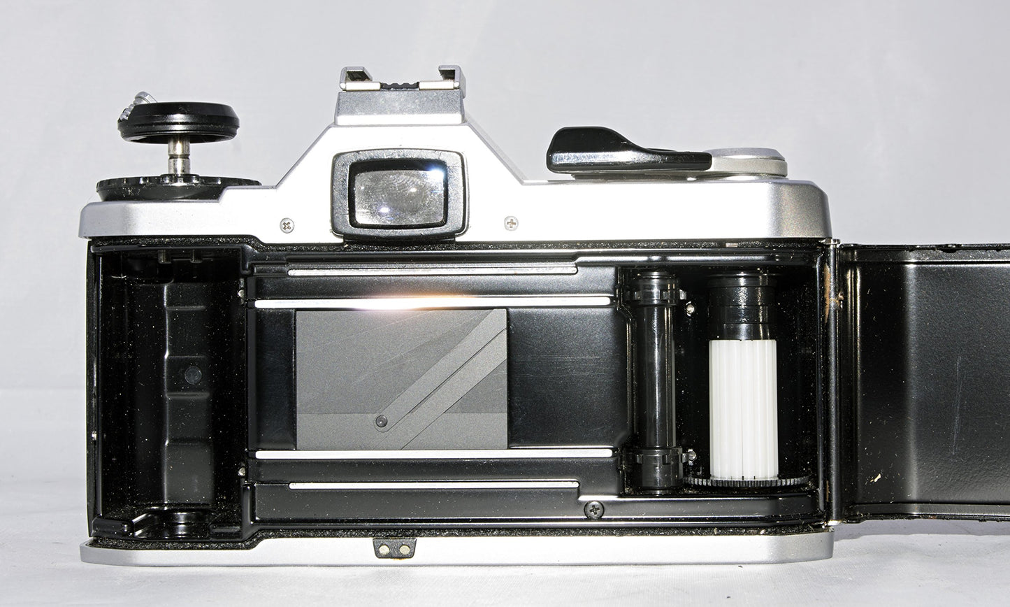 Pentax MG SLR Manual Focus Camera With a Pentax 50mm Lens