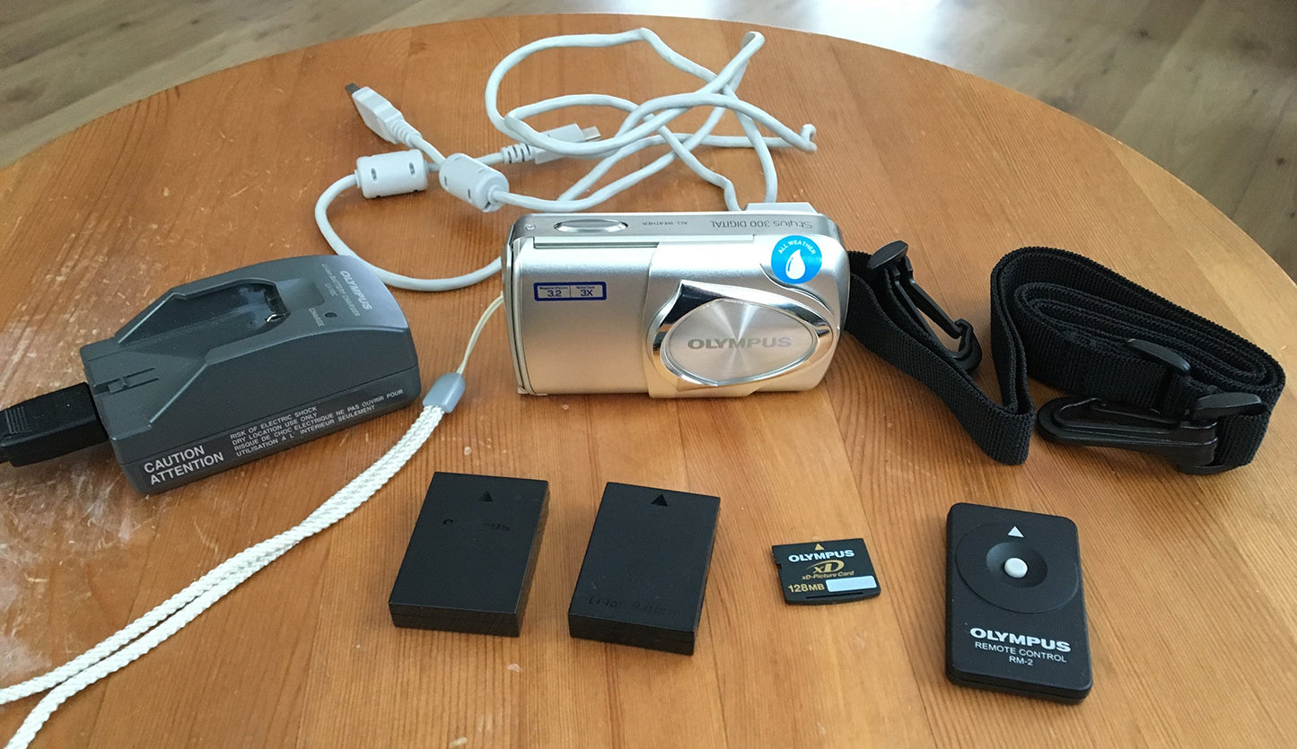 OM SYSTEM OLYMPUS Stylus 300 3.2 MP Digital Camera with 3x Optical Zoom