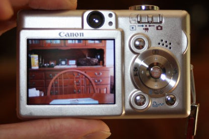 Canon Powershot SD300 4MP Digital Elph Camera with 3x Optical Zoom