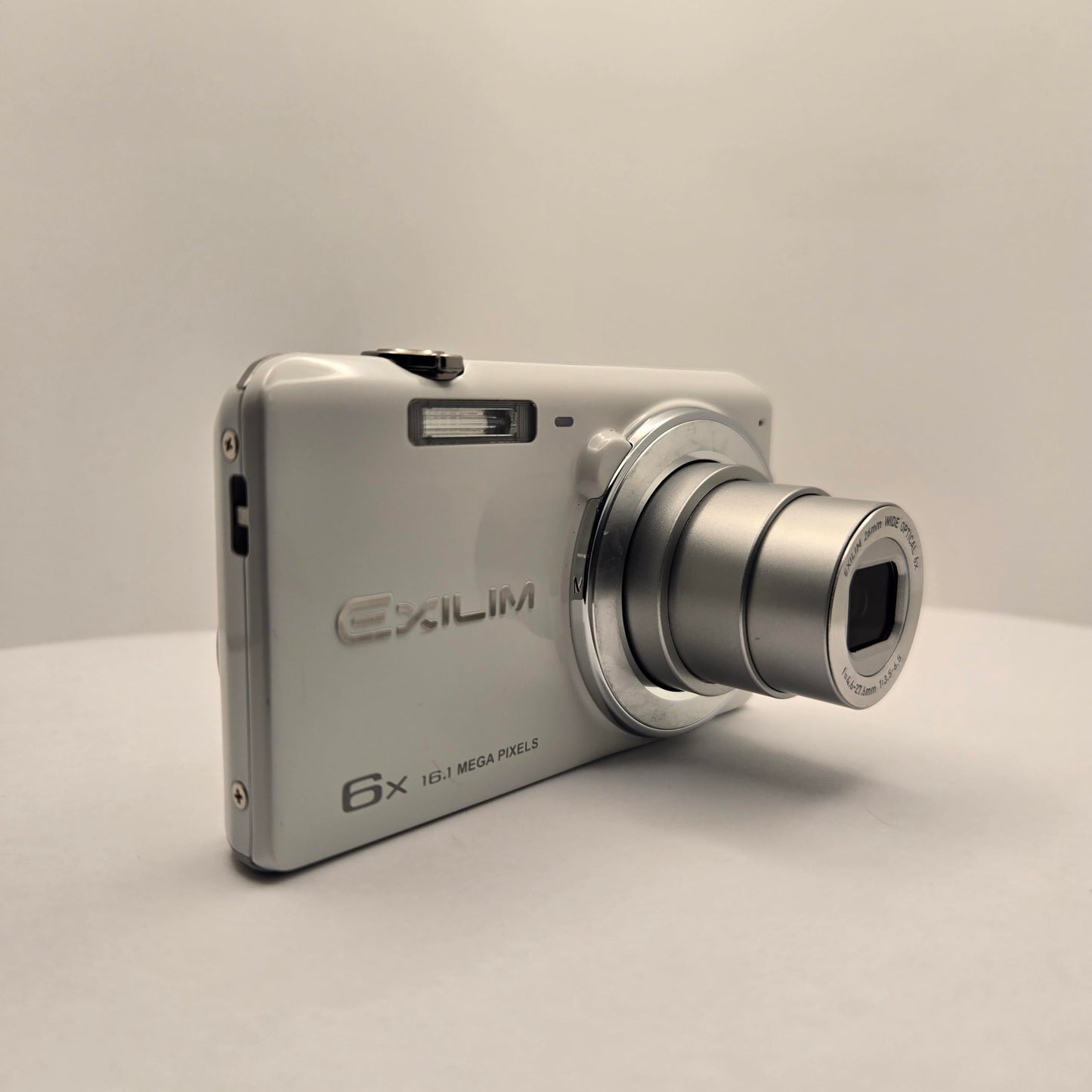 Yahemi Exilim EX-ZS25, 16.1mp, Compact Digital Camera Bundle with Tripod, Battery and Charger. Carrying Pouch and Microfiber Cloth [White]